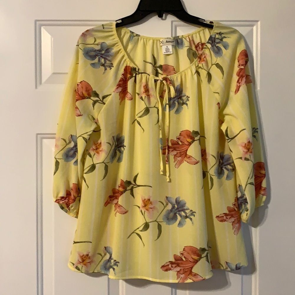 C.C. Armor yellow floral crepe like top with 3/4 sleeves.  NWOT